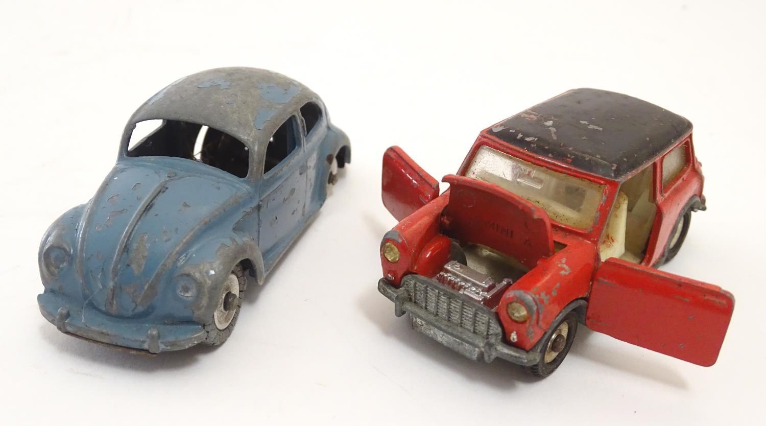 Toys: Four Dinky Toys die cast scale model cars comprising Mini Minor, with red body and black - Image 5 of 5