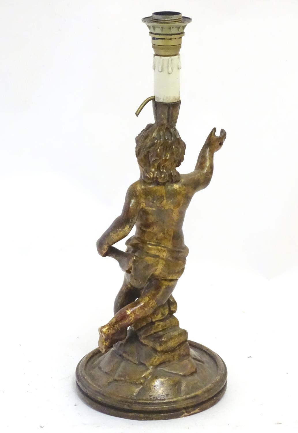 A 20thC Italian carved wooden lamp, formed as a putto with gilt finish and circular base, 21 1/4" - Image 2 of 5