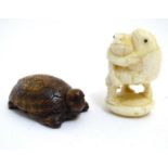 Two 20thC netsuke comprising a double sided example depicting a tortoise to one side and a bearded