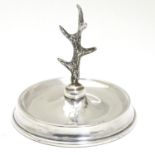 A silver ring tree hallmarked London 1921. 2 1/2" wide Please Note - we do not make reference to the