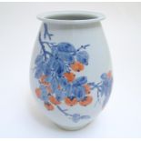A Japanese vase of ovoid form with hand painted fruiting and foliate detail. Character marks to