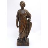 An 18th-19thC carved walnut statuette, depicting a classical female with shield, standing 34" Please