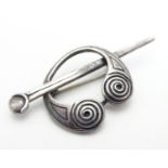 A silver brooch of penannular form approx. 2" long Please Note - we do not make reference to the