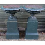 Garden & Architectural, Salvage: a pair of late 19thC cast iron urns with plinth bases, in green