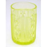 A Uranium glass beaker, decorated with crosshatching and star cuts, 4" tall Please Note - we do