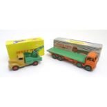 Toys: Two Dinky Toys die cast scale model vehicles comprising Foden Flat Truck, no. 902; and