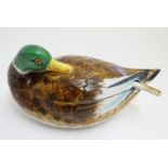 A Continental lidded soup tureen with ladle spoon, modelled as a mallard duck. Marked under. Approx.