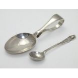 A child's silver spoon hallmarked Birmingham 1915 maker Crisford & Norris Ltd. Together with a