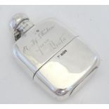 A Victorian silver hipflask with cup engraved RH Struben from Beata . Hallmarked Sheffield 1897