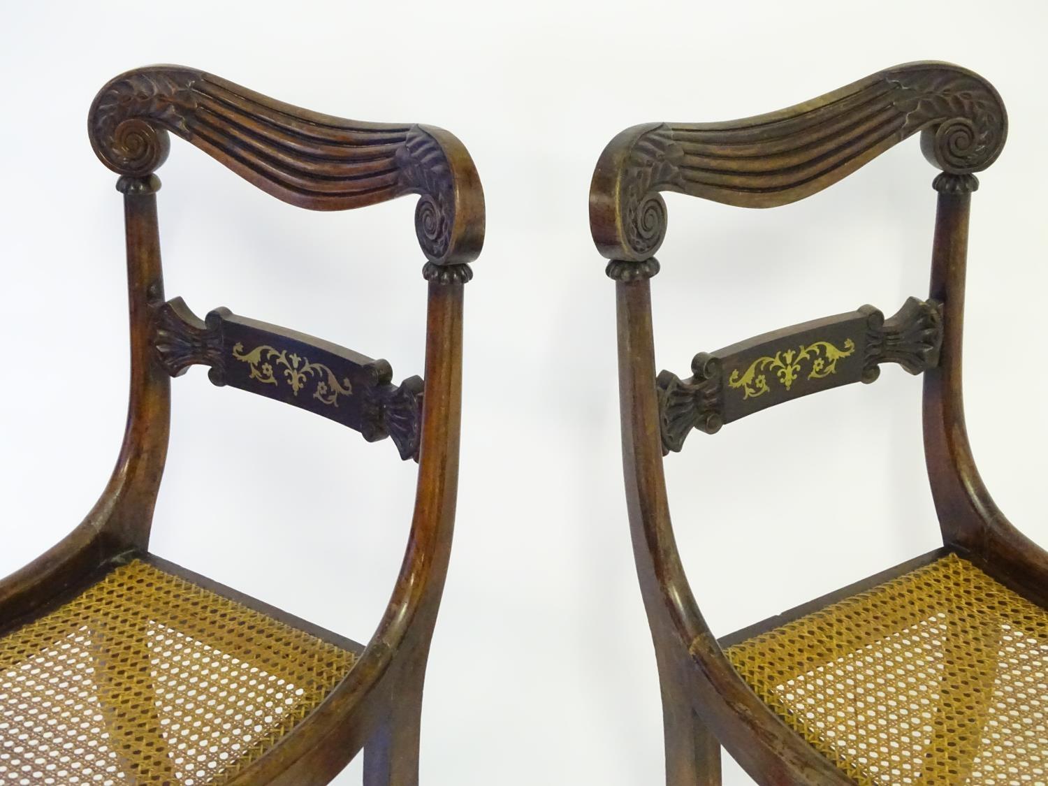A pair of mahogany 19thC chairs with carved scrolled top rails above brass inlayed mid rails and - Image 6 of 7