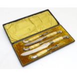 An early-20thC cased carving set by Francis Howard, Sheffield, comprising two forks, two knives