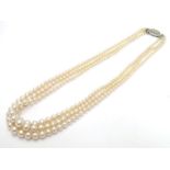 Vintage faux pearl three strand necklace by Rosita. Approx 15" long Please Note - we do not make