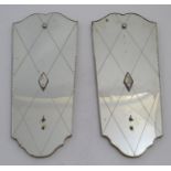 A pair of 20thC mirrored reflector sections for use with a girandole. 10 1/2" wide x 24" high.