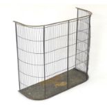 A Victorian fire / spark guard / nursery fender, of cast iron, tin and brass construction. 30" wide,