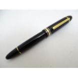 A boxed MontBlanc Meisterstück No. 149 fountain pen, in black finish with 14C gold nib, 5 3/4"