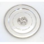A silver salver / trophy plate with horse and jockey medallion to centre engraved Shirley Heights