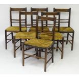 A set of six late 19thC ash and beech Morris & Co. style chairs, having envelope rush seats above