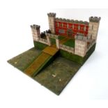 Toy: A WW2 (World War Two) era scratch built model of a four turreted castle with draw bridge, the