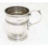A silver Christening mug. Hallmarked Birmingham 1924 maker William Suckling Ltd. Approx 3" high