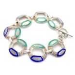 A Continental .800 silver vintage retro bracelet the 7 roundels with blue and green enamel