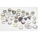 Rings : Assorted silver and white metal etc rings including a hallmarked silver ring set with