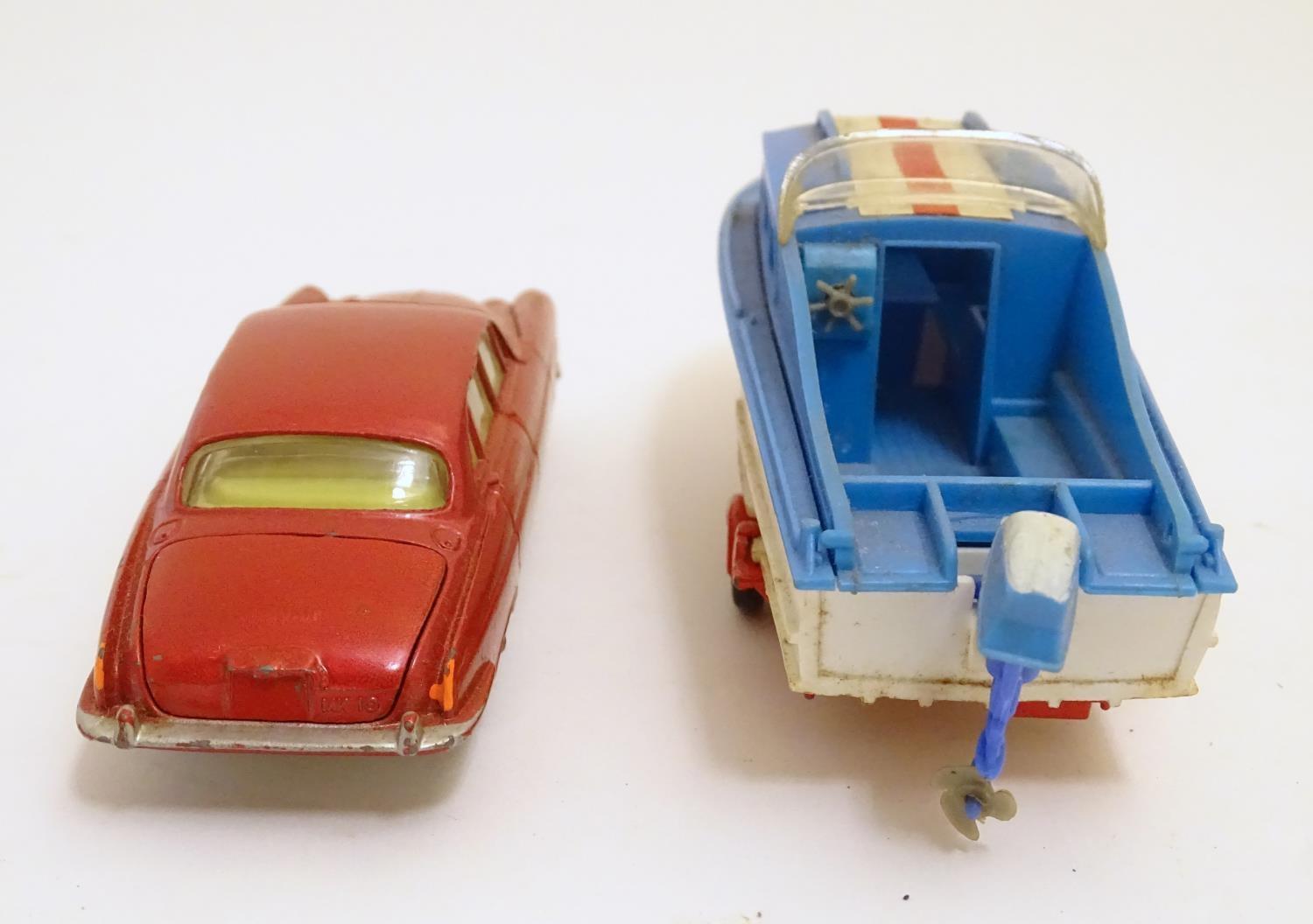 Toys: Two die cast scale model boat and car Corgi Toys to include a Dolphin 20 Cruiser on Wincheon - Image 6 of 8