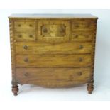 A late 19thC mahogany north country chest of drawers comprising a central geometrically moulded