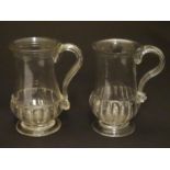 A matched pair of 18thC handled drinking glasses, each with fluted and ribbed decoration, 4 1/2"