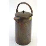 Kitchenalia: an early-20thC copper dairy can, with hinged spout and swing handles, 12" tall Please
