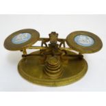 A set of Victorian brass desk / postage scales with five weights, the scales with Jasperware style