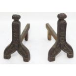 Garden & Architectural, Salvage: a pair of cast iron andirons, decorated with foliate detail, 17 1/