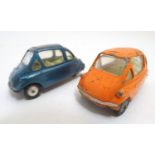 Toys: Two Corgi Toys die cast scale model Heinkel Economy Cars, model no. 233, one with orange body,
