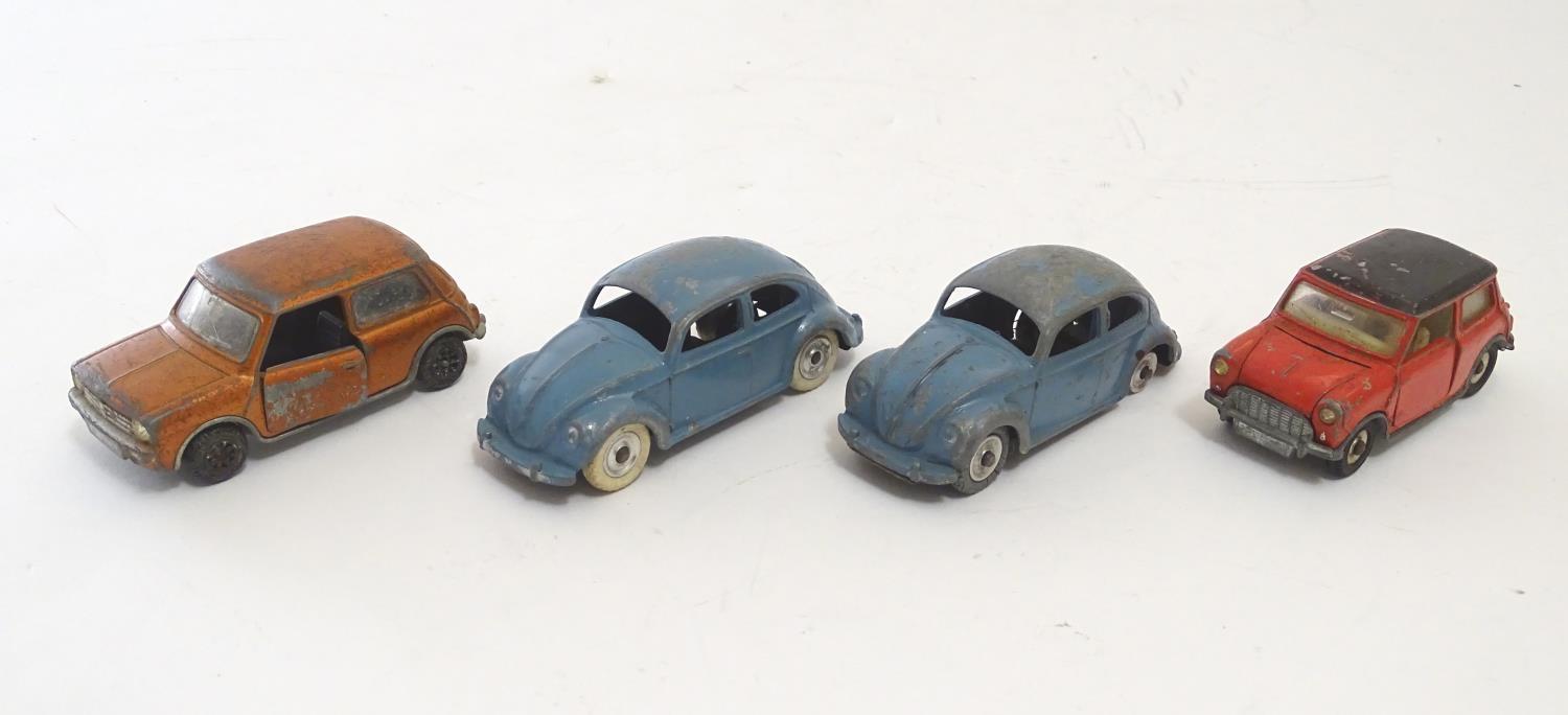 Toys: Four Dinky Toys die cast scale model cars comprising Mini Minor, with red body and black - Image 3 of 5