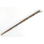 Ethnographic / Native / Tribal: A carved wooden ceremonial staff, the shaft formed as carved figures