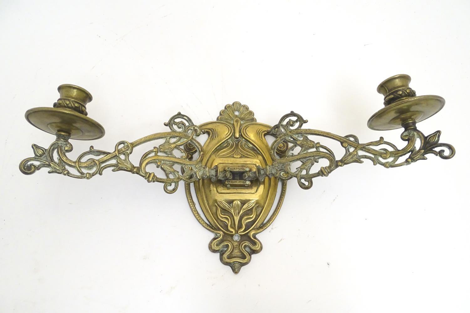 A trio of 19thC brass adjustable double wall sconces, decorated with acanthus fronds and elements of - Image 5 of 6