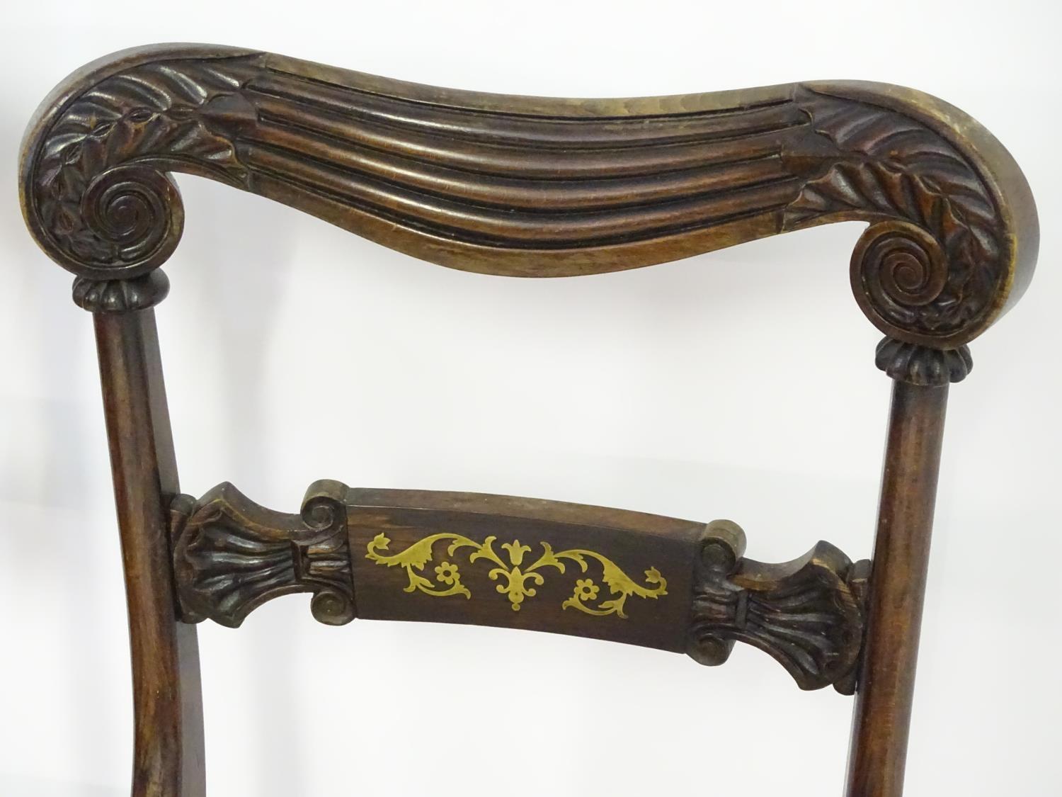 A pair of mahogany 19thC chairs with carved scrolled top rails above brass inlayed mid rails and - Image 4 of 7