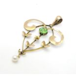 A 9ct gold Art Nouveau pendant set with green stone and pearl drop 1 1/" long Please Note - we do