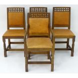 A set of four oak Arts and Crafts style dining chairs in tan leather made by Derek 'Lizardman'