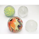 A collection of four 20thC art glass paperweights, the largest approximately 4 1/4" tall (4)