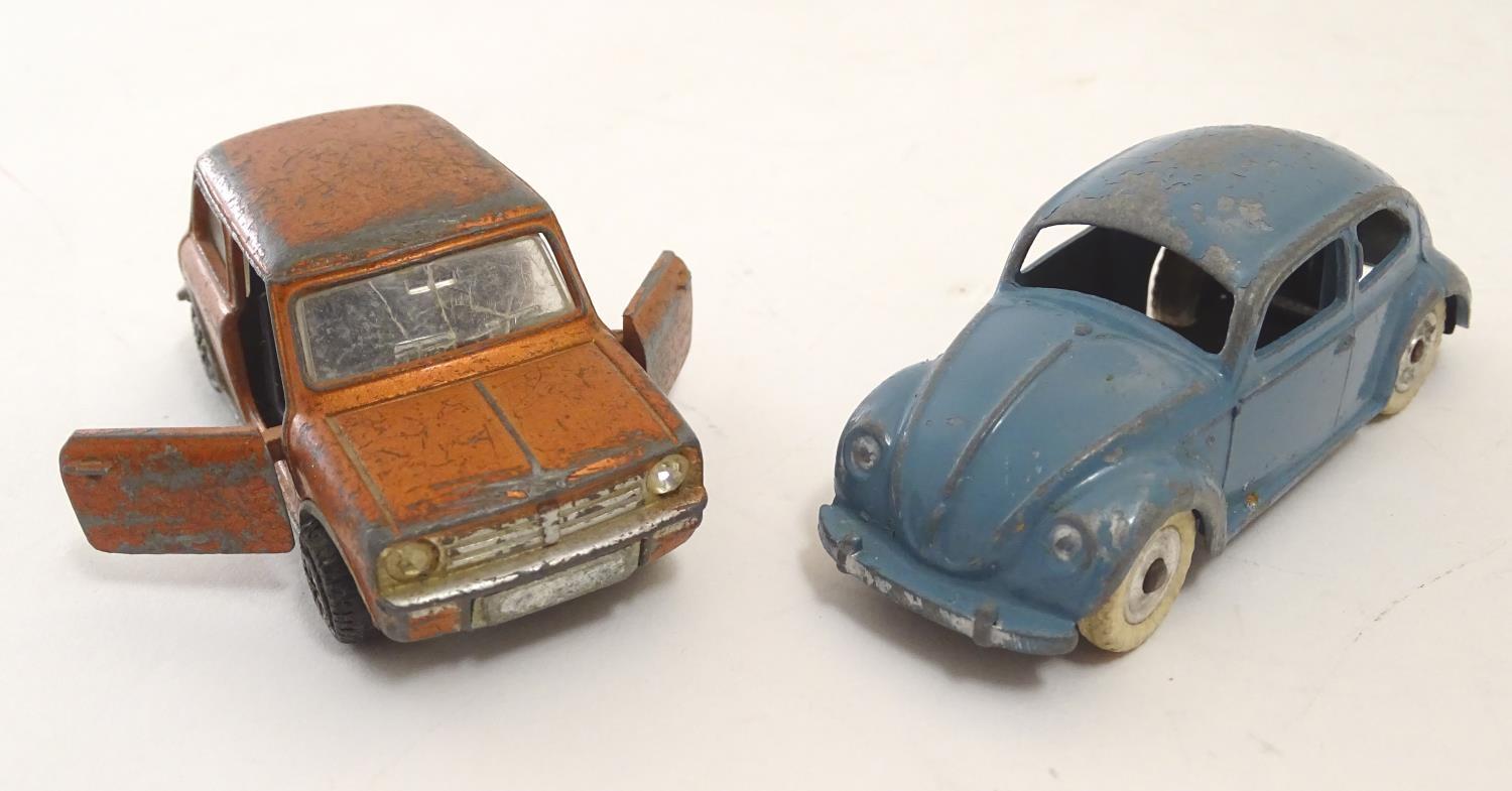 Toys: Four Dinky Toys die cast scale model cars comprising Mini Minor, with red body and black - Image 4 of 5