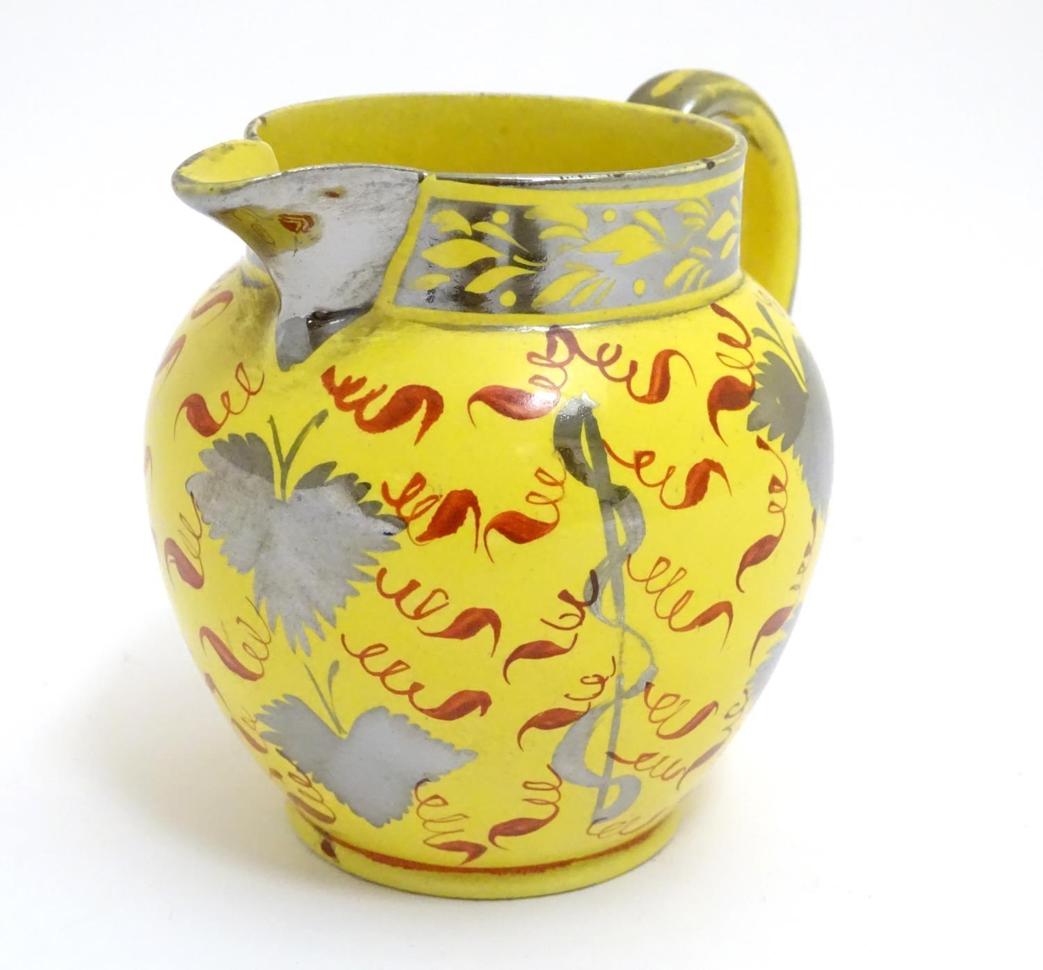 A 19thC canary yellow Sunderland lustre cream jug with stylised lustre leaf and foliate - Image 3 of 8