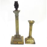 An early to mid 20thC brass table lamp formed as a corinthian column, 14" tall, together with