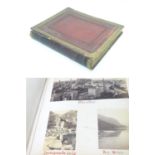 An early 20thC photograph album, with affixed Edwardian monochrome photographs depicting 'Roslin' (