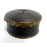 A 19thC snuff box of circular form with turned decoration with hinged lid. Approx. 1 1/4" high