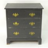 An early 20thC chest of drawers comprising three long drawers with brass swan neck handles and solid