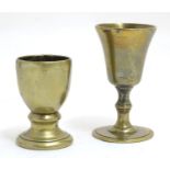 Two 18thC brass wine goblets, of trumpet and barrel form, the largest 3 1/4" tall Please Note - we