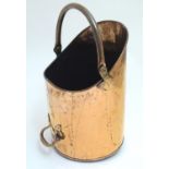A 19thC copper coal bucket / scuttle, with fixed and swing handles, 18" tall Please Note - we do not