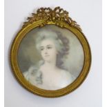 A 20thC portrait miniature print depicting a portrait of a lady in the manner of Sir Joshua