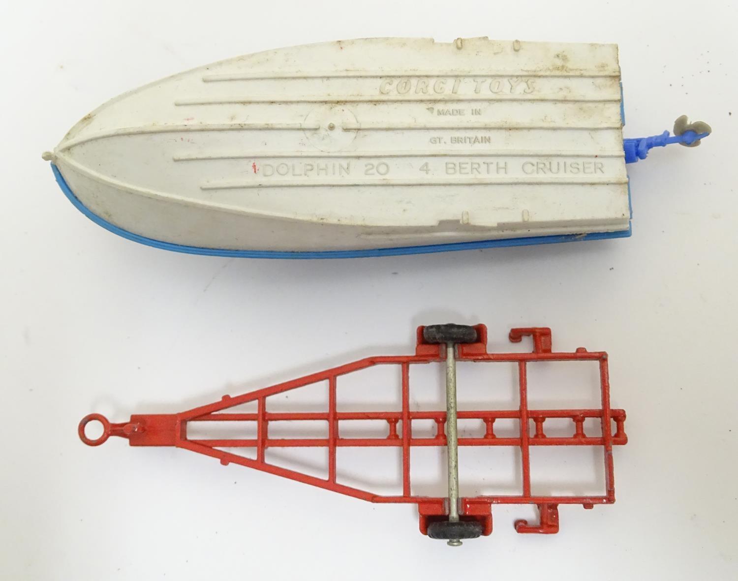 Toys: Two die cast scale model boat and car Corgi Toys to include a Dolphin 20 Cruiser on Wincheon - Image 8 of 8