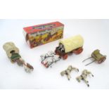 Toys: A Timpo Toys Covered Wagon with two horses and a cowboy, boxed. Together with Buffalo Bill's